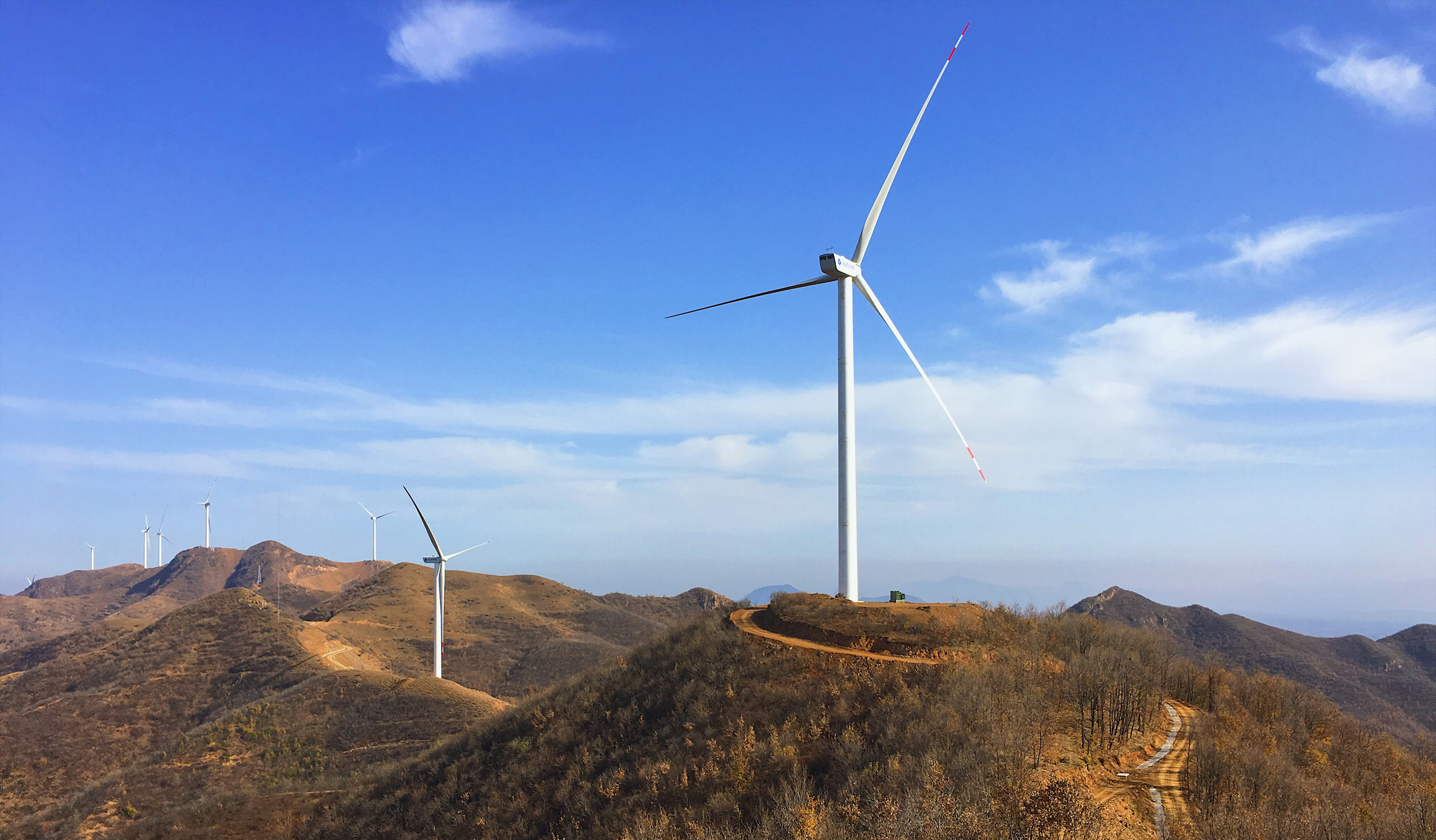 J9.COM股份与华能新能源召开年度战术合作深入会议